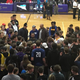 The crowd around LaVar Ball, the real star of the show.